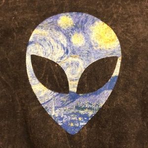 A long sleeve shirt with aliens on it